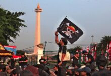 300 Corvette Bentangkan Bendera Raksasa di Belle Isle, Persembahan untuk Para Veteran